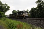 NS 1813 takes train 20K onto the siding